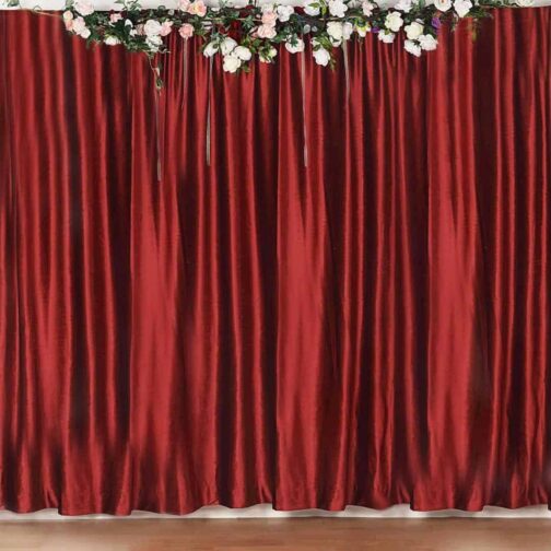 Red curtain with flowers on top